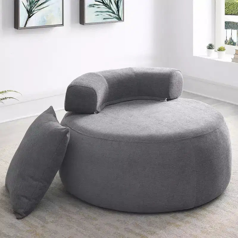 Poltrona lounge rotonda imbottita con cuscino