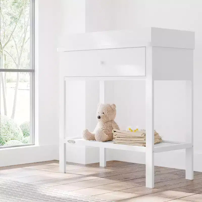 Fasciatoio con cassetto e ripiano aperto