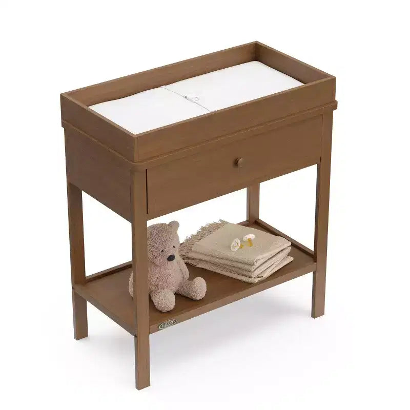 Fasciatoio con cassetto e ripiano aperto